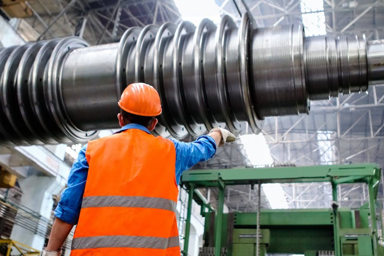 man working in orange helmet
